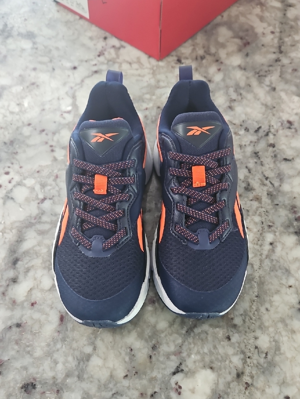 Boys Reebok Navy Athletic Sneakers with Orange Accents